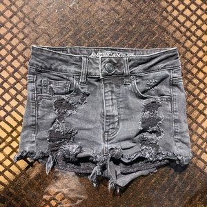 High waisted distressed black jean shorts